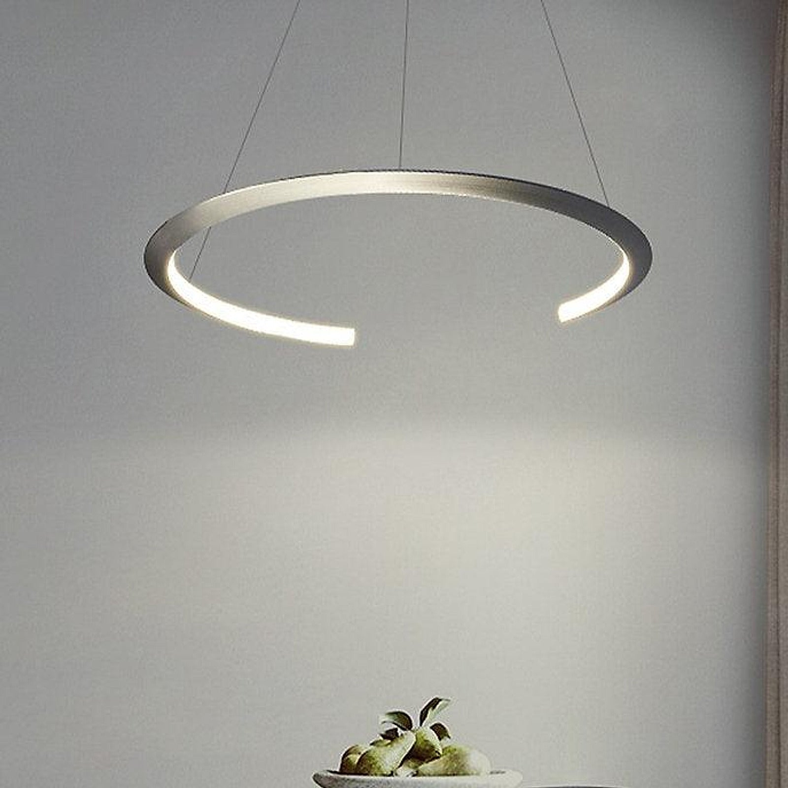 LED ARC-D modern sculptural pendant in a double-volume living room