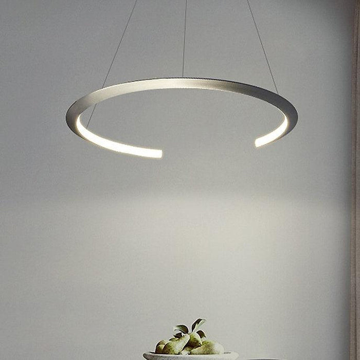 LED ARC-D modern sculptural pendant in a double-volume living room