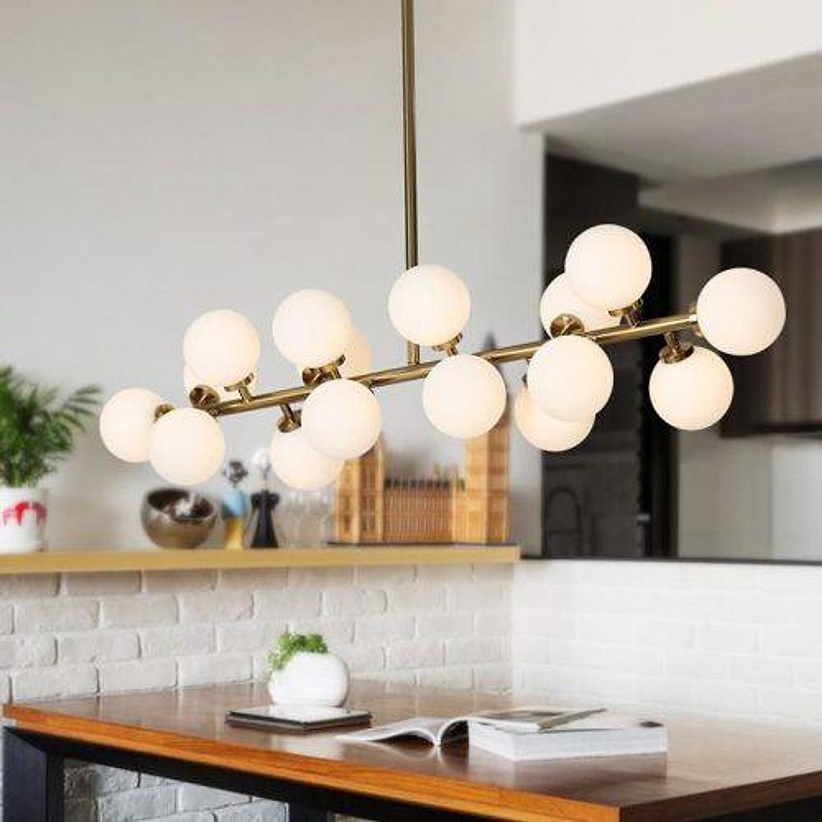 Double-Volume Dining Area Lighting: Choosing a Chandelier Over the Table featuring Natalie Linear Chandelier