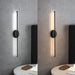 MARIUSKAR Sleek Balanced Wall Lamp.