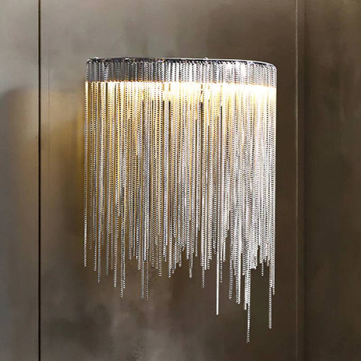 Cadena Tassel Wall Sconce.