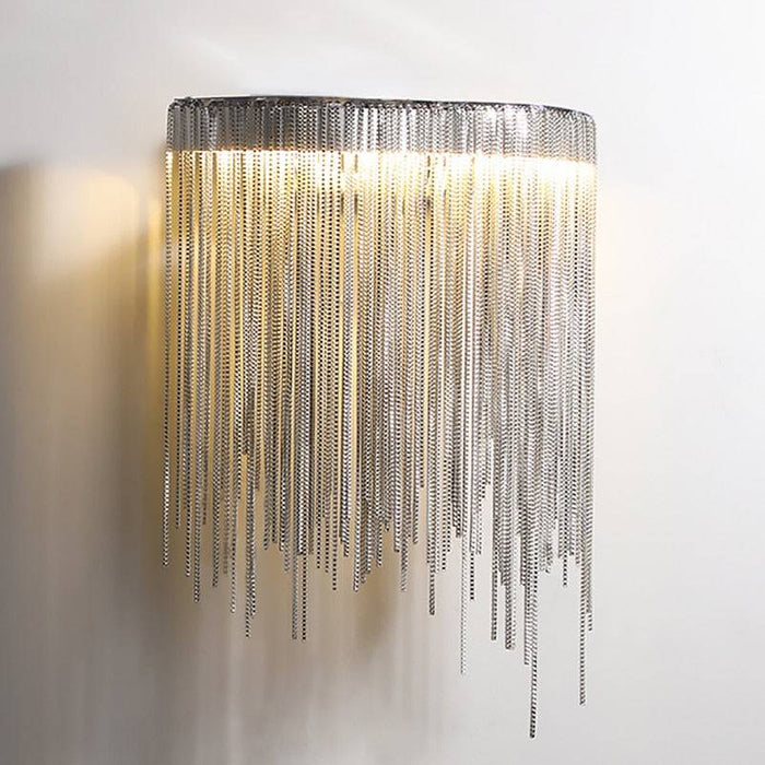 Cadena Tassel Wall Sconce.