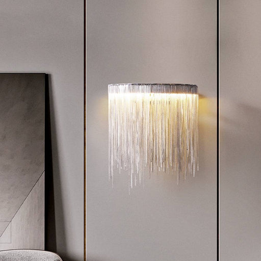 Cadena Tassel Wall Sconce.