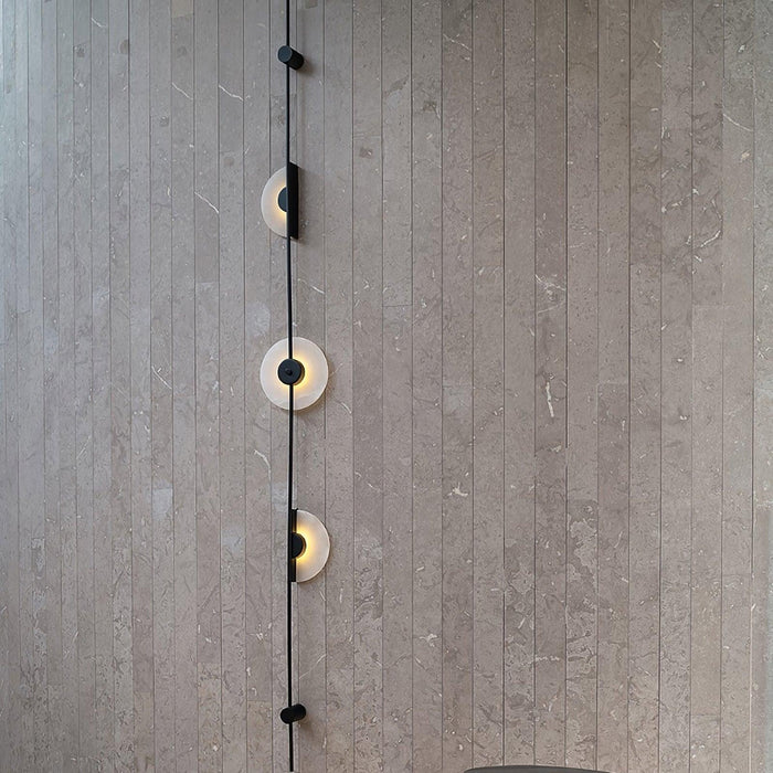 Alabaster Vertical Plug-in Wall Sconce.