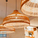 Artisanal Rattan Dome Pendant Lamp.