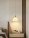 Brass Pleated Ceramic Pendant Lamp.