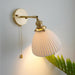 Brass Pleated Ceramic Wall Lamp.