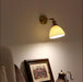 Brass Pleated Ceramic Wall Lamp.