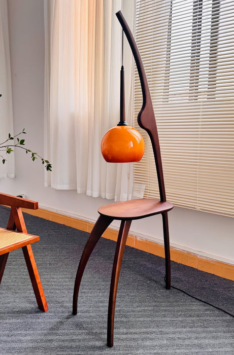 Curved Mantis Arm Floor Lamp.