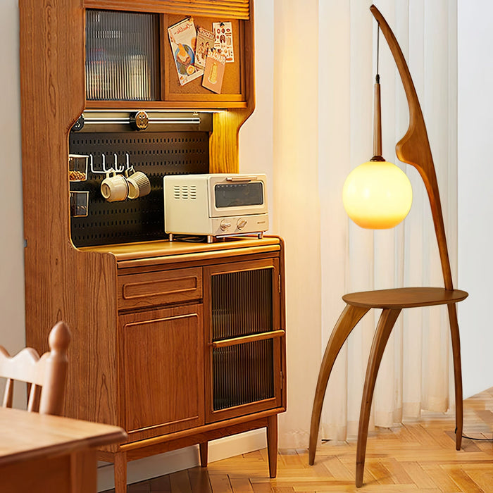 Curved Mantis Arm Floor Lamp.