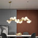 Eli Glass Globes Linear Chandelier For Dining Room.