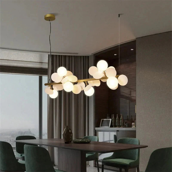 Eli Glass Globes Linear Chandelier For Dining Room.