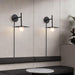 Gea Iron Plug-In Wall Lamp.