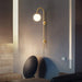 Globe Brass Plug-in Wall Sconce.