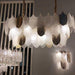 Postmodern Luxury Golden Feathers Chandelier.