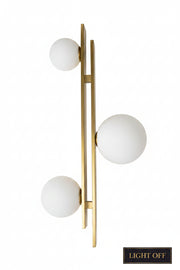 Gold handle with white knobs on a wooden door