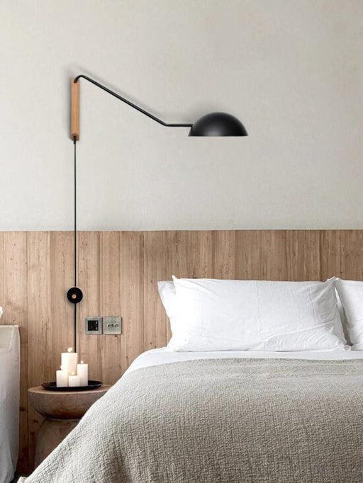 Marika Long Arm Wall Lamp.