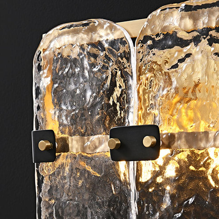 Massive Glass Wall Sconces.