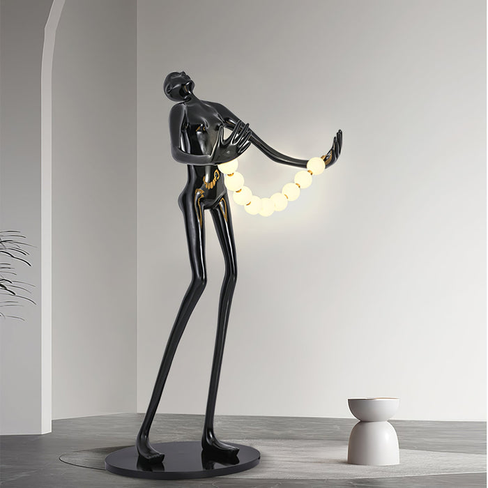 Orb Juggler Sculpture Floor Lamp.