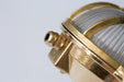 Nautilus Oval brass cage outdoor wall light / ceiling Light.