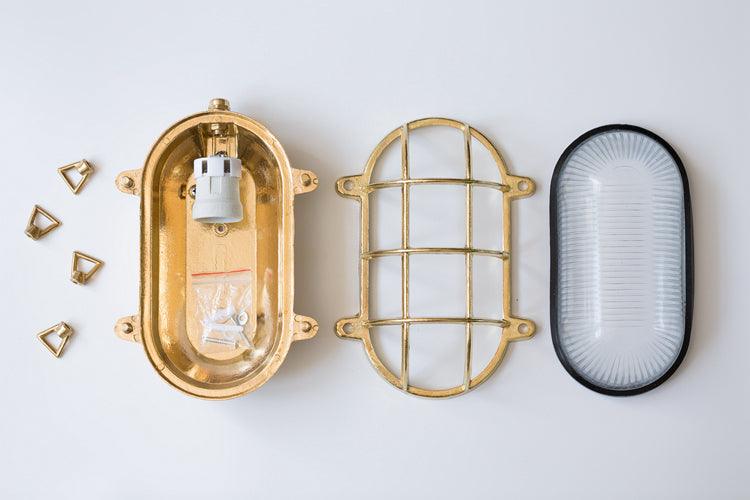 Nautilus Oval brass cage outdoor wall light / ceiling Light.