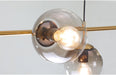 Olive Tree Branch 4 Bulb Staircase Void Brass Pendant Light.