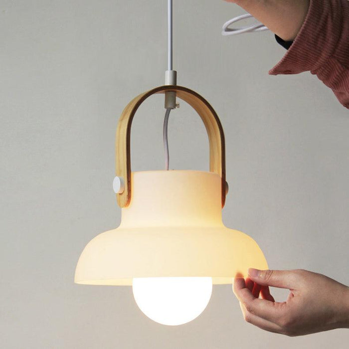 Skandi white milk glass wooden handle pendant light.