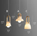 Skandi white milk glass wooden handle pendant light.