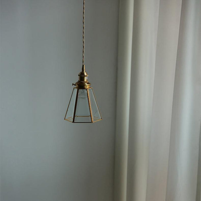 Lanterna brass frame glass pendant light.