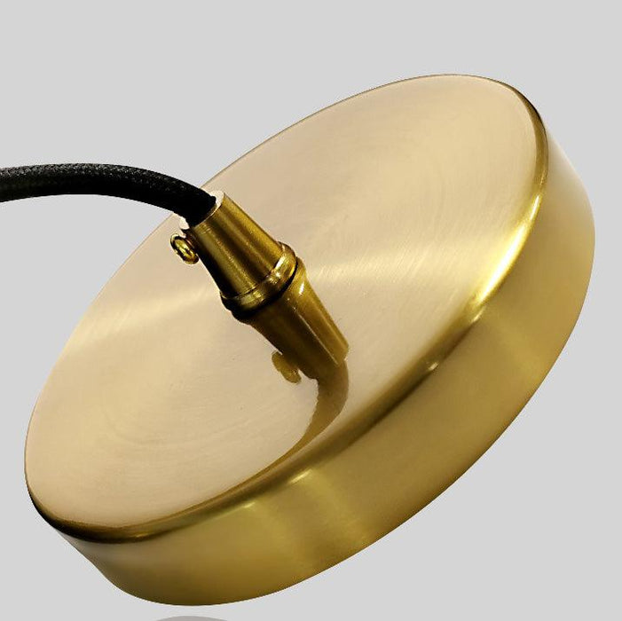 Raffles two tone black and brass pendant light.