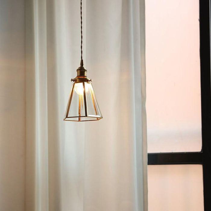 Lanterna brass frame glass pendant light.