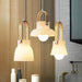 Skandi white milk glass wooden handle pendant light.