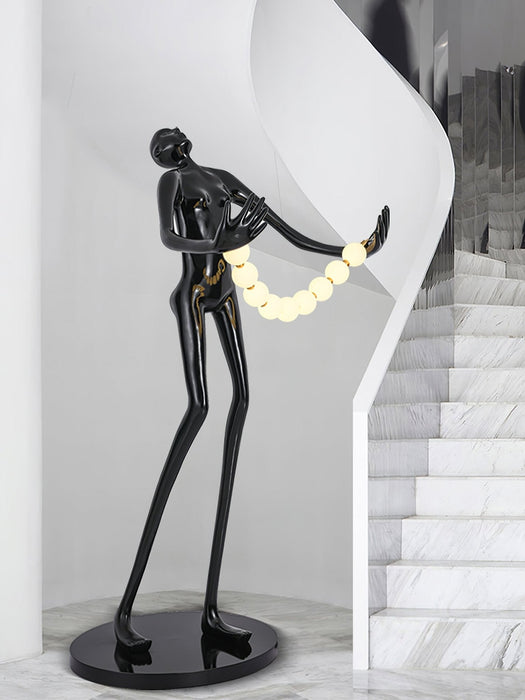 Orb Juggler Sculpture Floor Lamp.