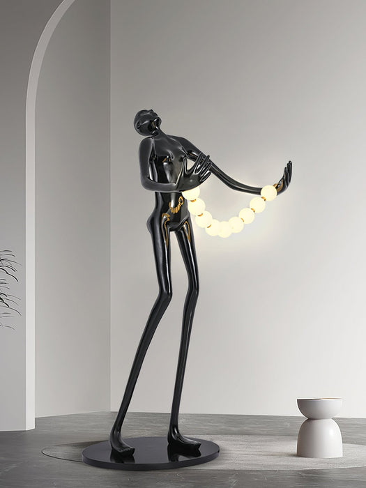 Orb Juggler Sculpture Floor Lamp.