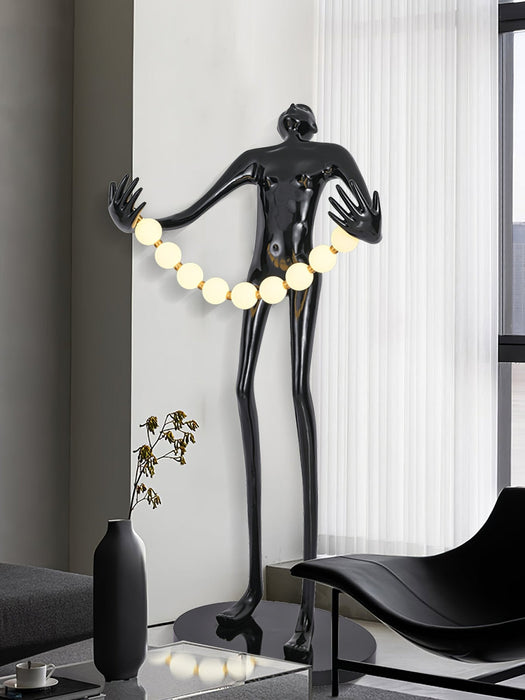 Orb Juggler Sculpture Floor Lamp.