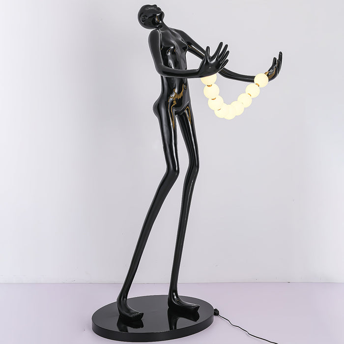 Orb Juggler Sculpture Floor Lamp.