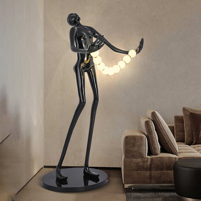 Orb Juggler Sculpture Floor Lamp.