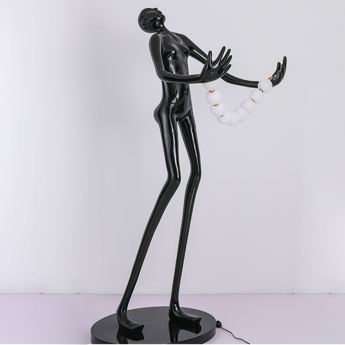 Orb Juggler Sculpture Floor Lamp.