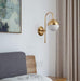 Ragnoku Yellow Copper Round Globe Wall Lamp.