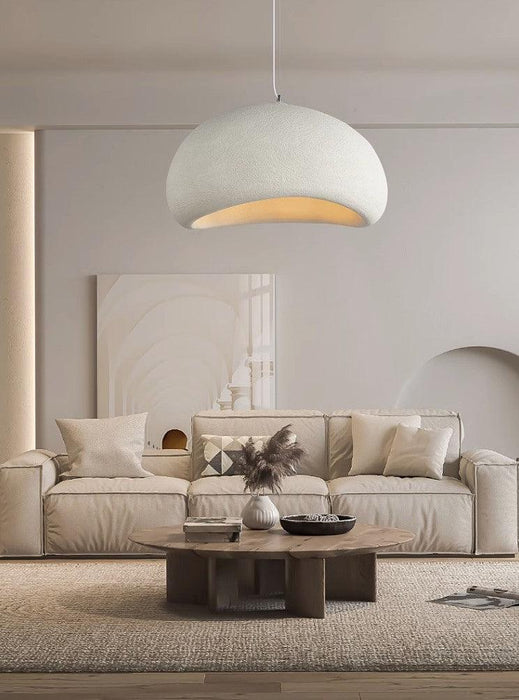 Stucco textured pebble stone plaster pendant light.