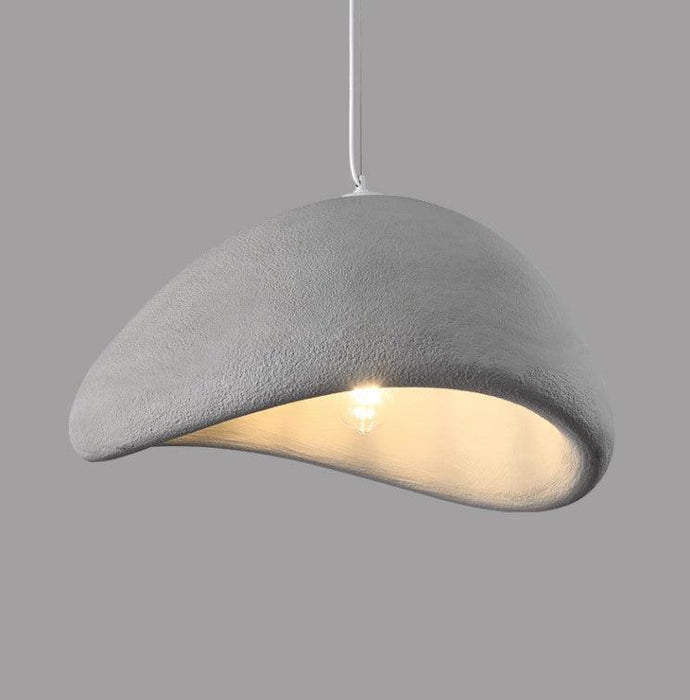 Stucco textured pebble stone plaster pendant light.