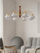 Swedish Modern Brass Chandelier.