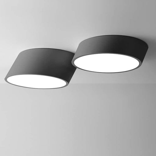 VILHELMINA Inclined Elliptical Ceiling Light.