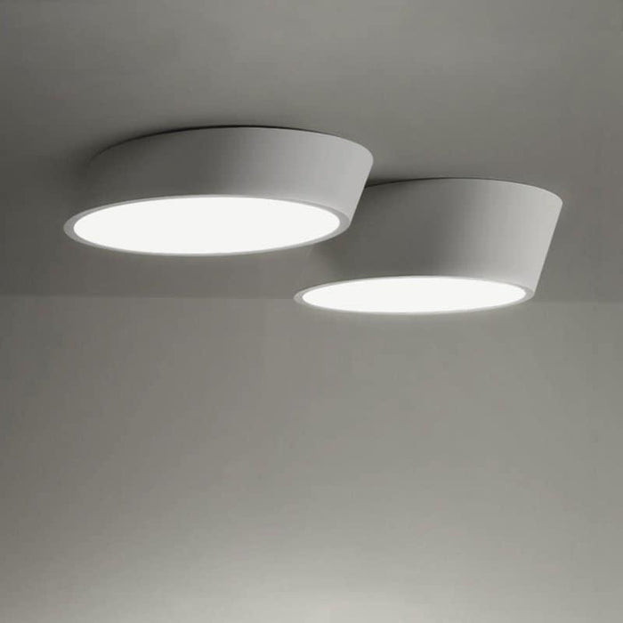 VILHELMINA Inclined Elliptical Ceiling Light.