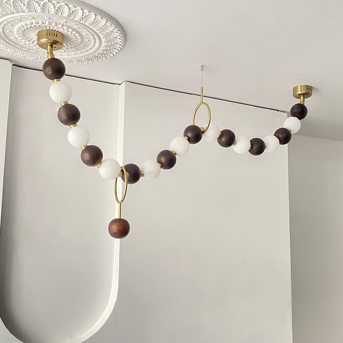 Walnut Bead Necklace Chandelier.