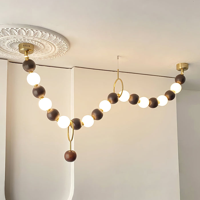 Walnut Bead Necklace Chandelier.