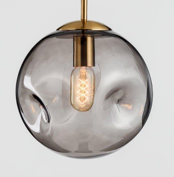 Aminta Dimpled Glass Shade Brass Pendant Light.