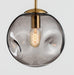 Aminta Dimpled Glass Shade Brass Pendant Light.