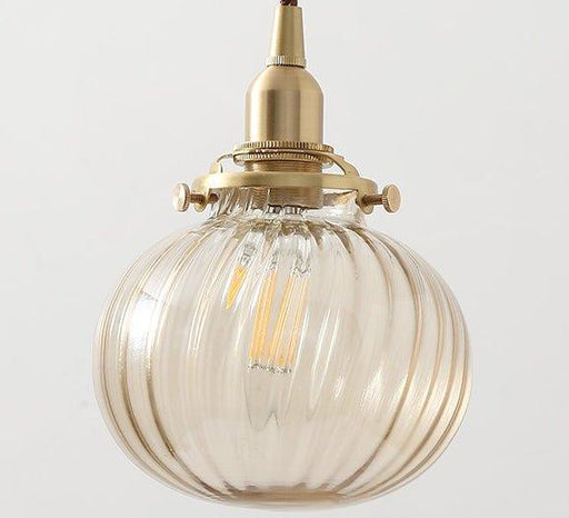 Anemone swirled glass brass pendant Light.