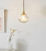 Anemone swirled glass brass pendant Light.